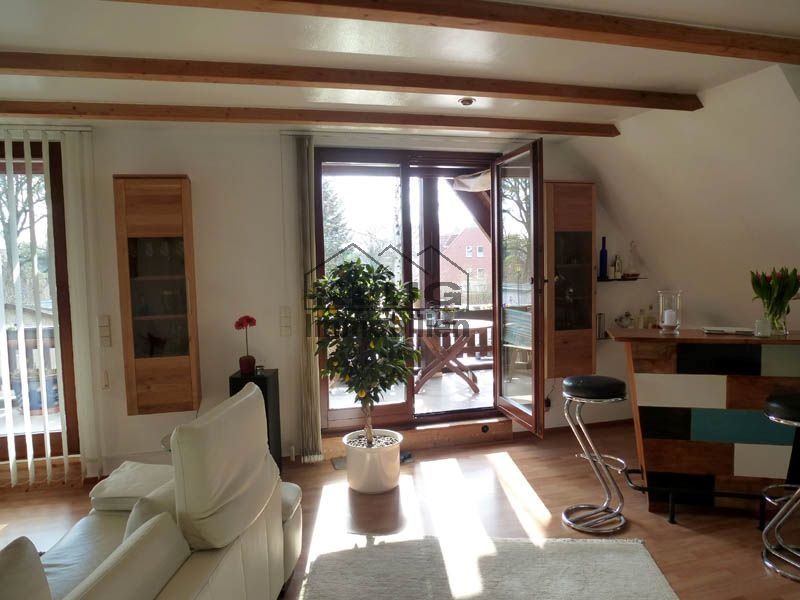 Wohnzimmer mit Ausgang zur Log