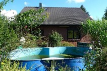 05 - Haus 2 Rückansicht mit Swimmin