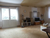 09 - Wohnzimmer mit Ausgang zur Ter