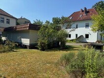 03 - Rückansicht mit Garagen ud Gar
