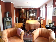 12 - Wohnzimmer mit Esstisch und Ka