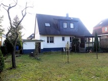 04 - Rückansicht mit überdachter Te