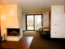 09 - Wohnzimmer mit Kamin, Essplatz
