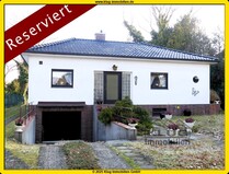RESERVIERT! Bestgepflegter Massivbungalow mit tagesbelichtetem Keller u. Garage in Fließtallage!