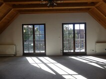 14 - Goßes Dachzimmer mit Balkon