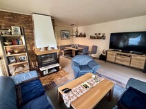 11 - Wohnzimmer mit Kamin