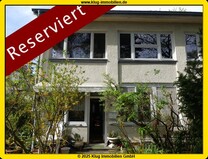 RESERVIERT! Tegelort - Modernisierungsbedürftige 2,5 Zimmer Erdgeschosswohnung mit eigenem Garten