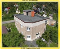 01 - Rückansicht mit Sonnenterrasse