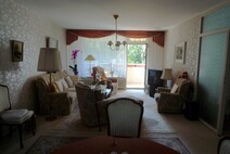 04 - Wohnzimmer mit Ausgang zum Son