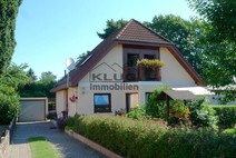 04 - Frontansicht mit Eingang u. Ga