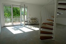 06 - Bild Wohnzimmer mit Wendeltrep